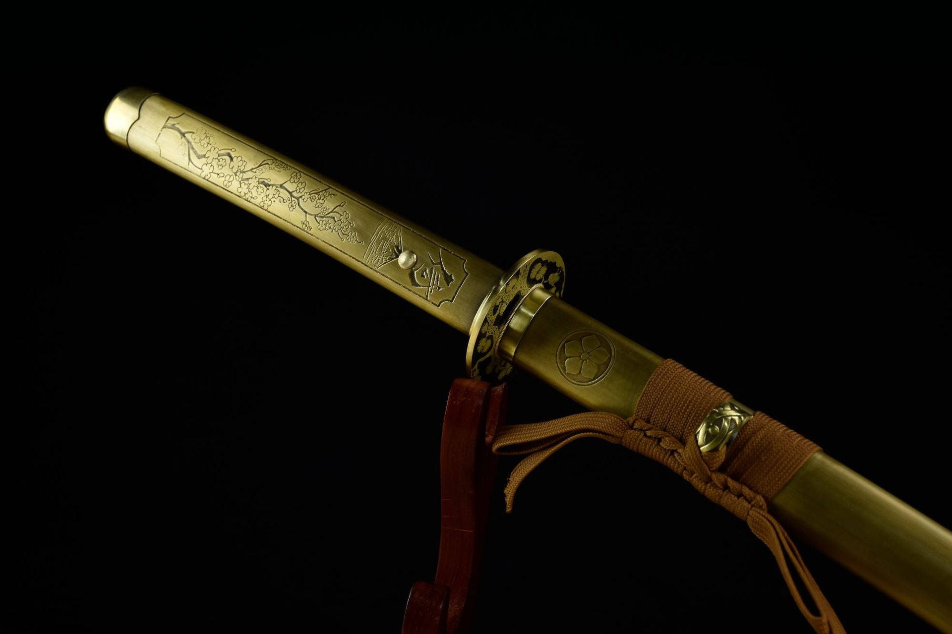 Copper handle and scabbard, intricately engraved with sakura.