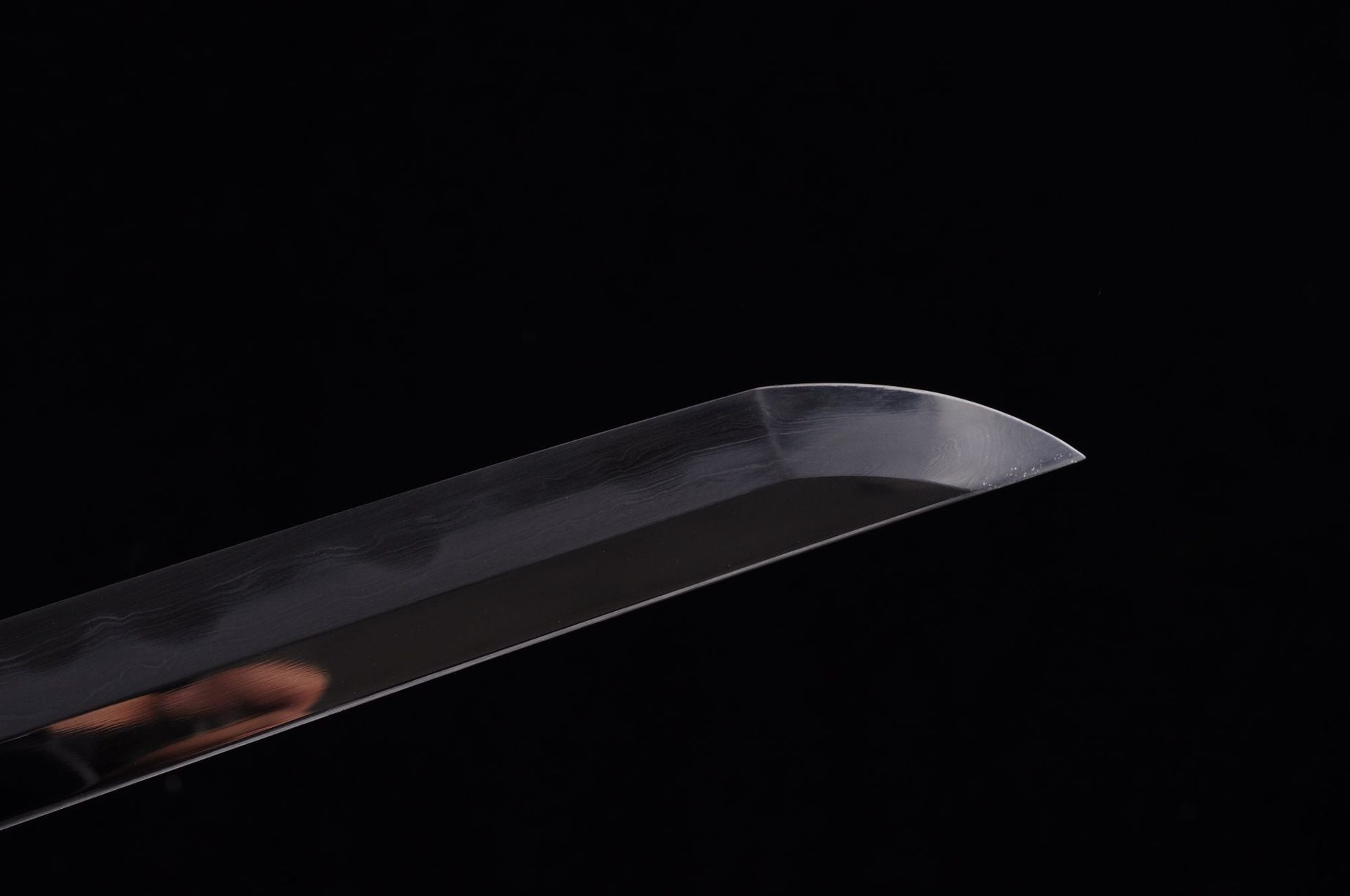 Daisy katana kissaki highlighting the refined craftsmanship.