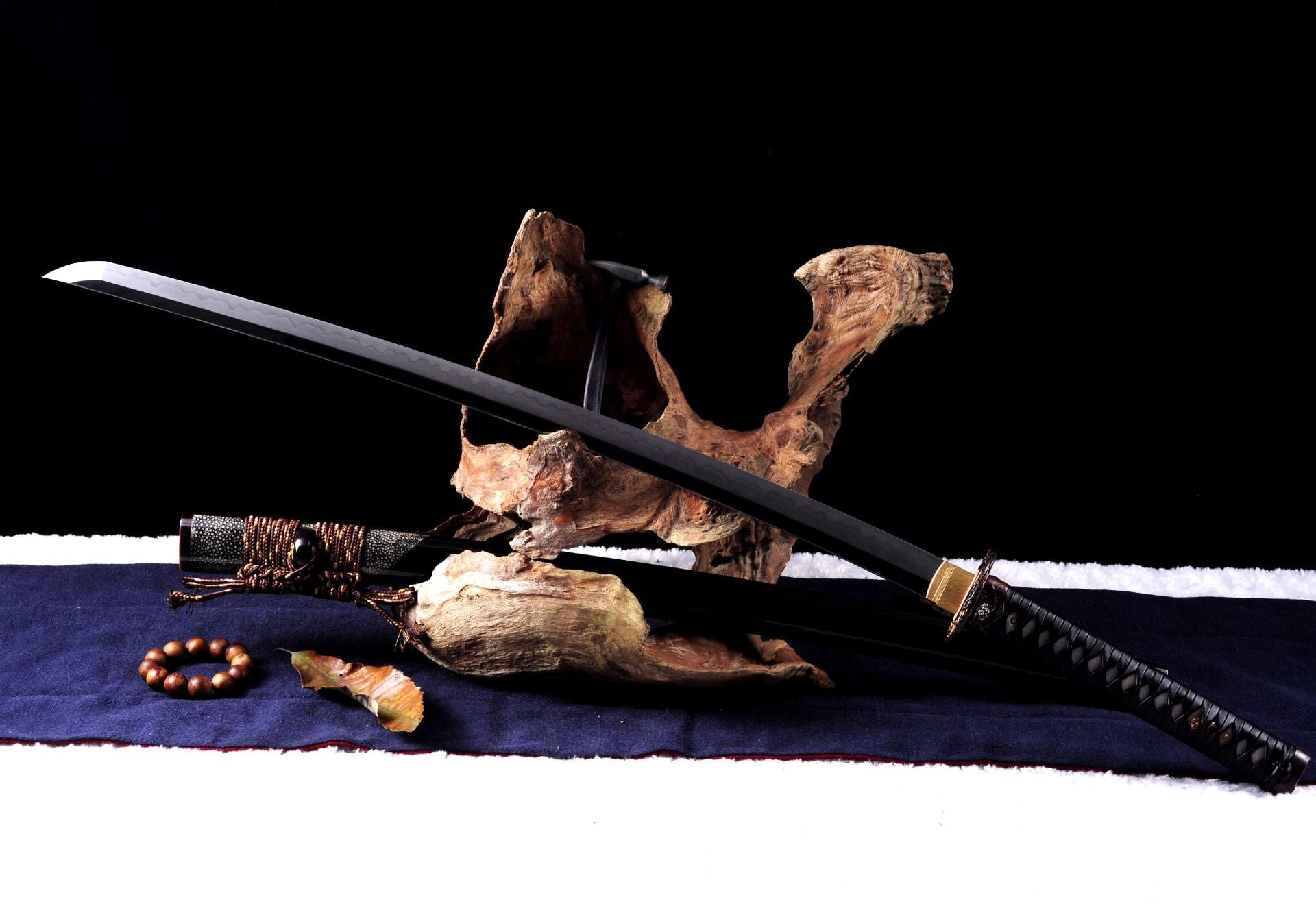 Genji carbon steel katana with kobuse forge.