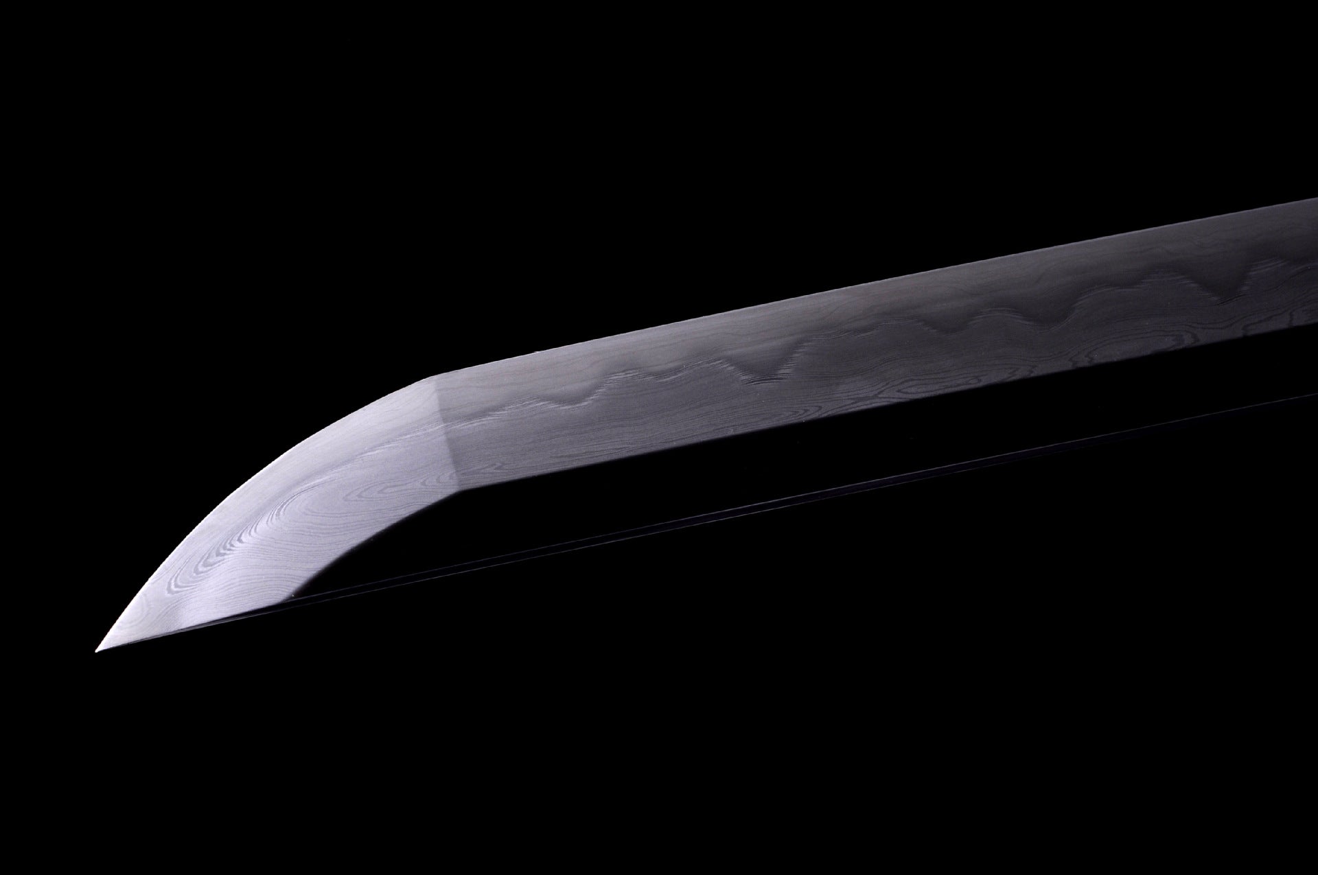 Hand-sharpened kissaki of a Genji katana