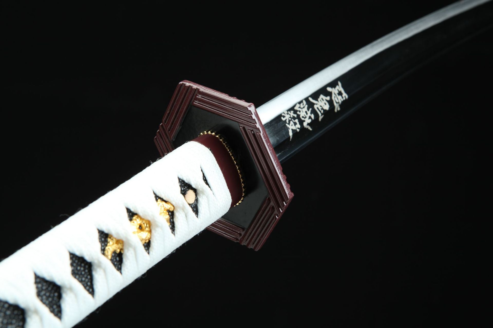 Giyu Tomioka’s Nichirin Sword with hexagonal guard, purple-red border, and black handle wrapped in white cord from Demon Slayer.