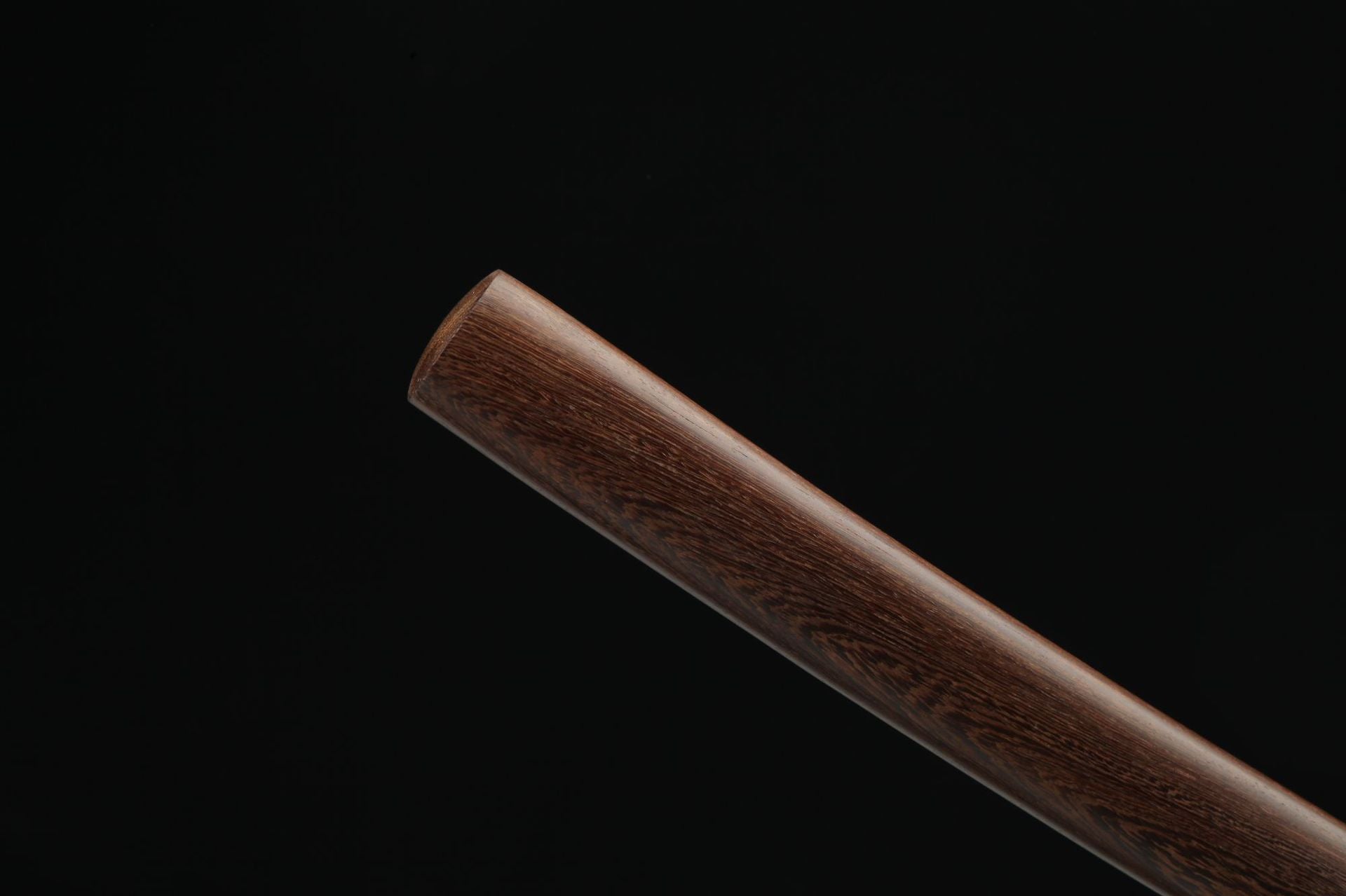 Close-up of the Jiang Tai Gong katana's saya end, highlighting the smooth wooden texture and elegant finish.