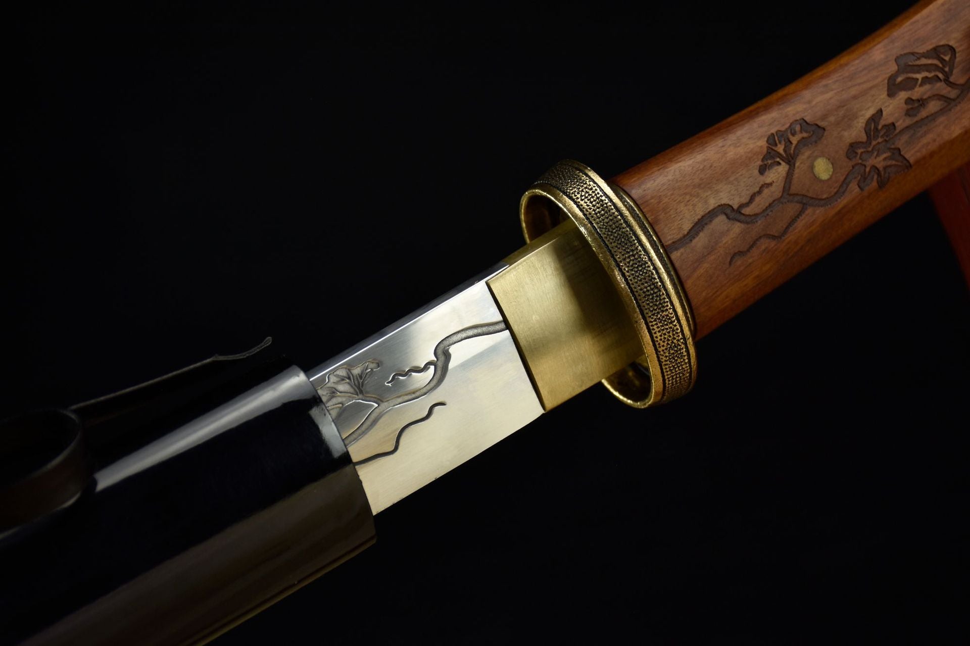 The katana being drawn from its saya, showcasing the smooth transition and graceful movement of the blade.