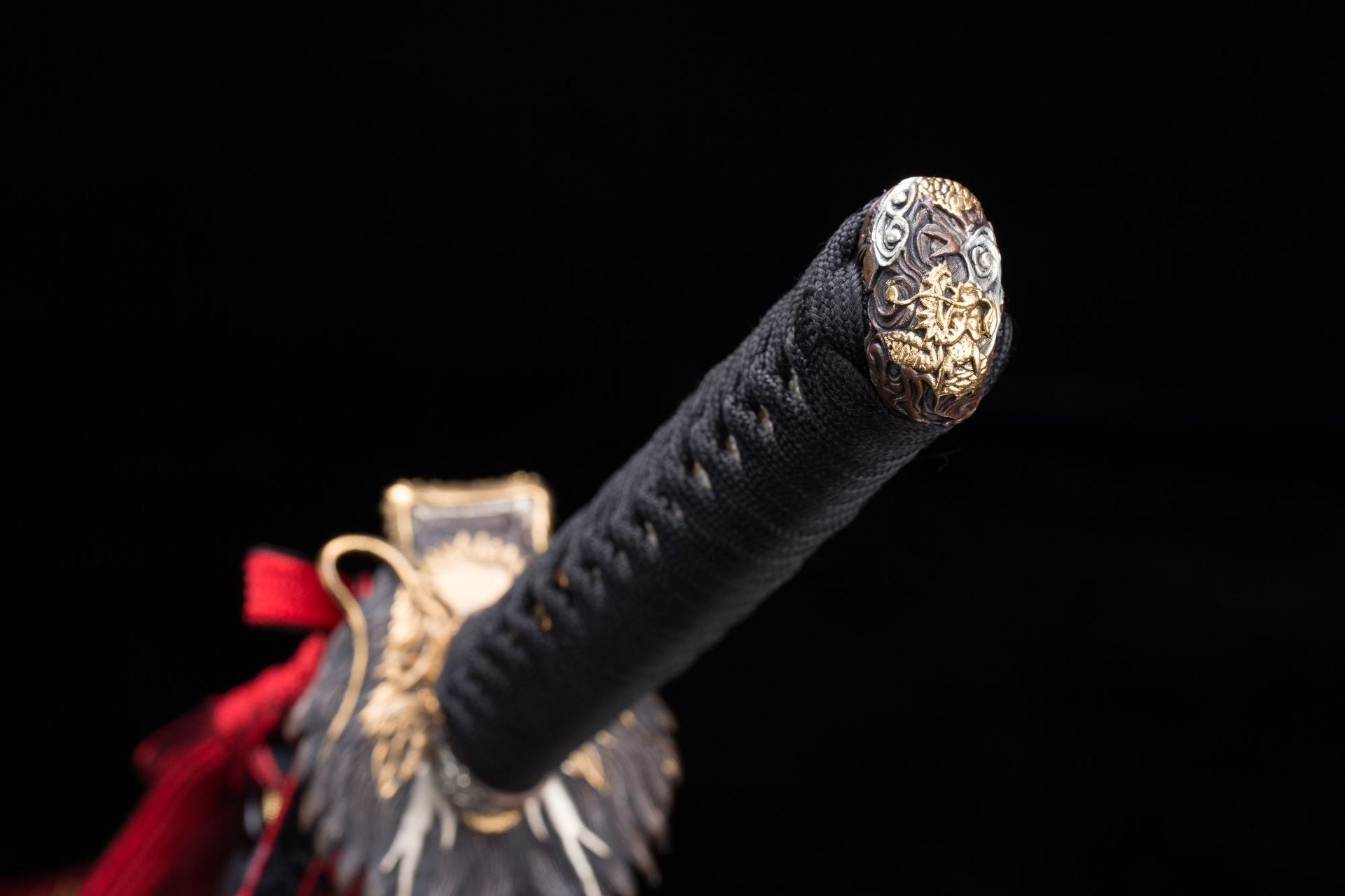 Dragon-engraved kashira for a Loong katana.