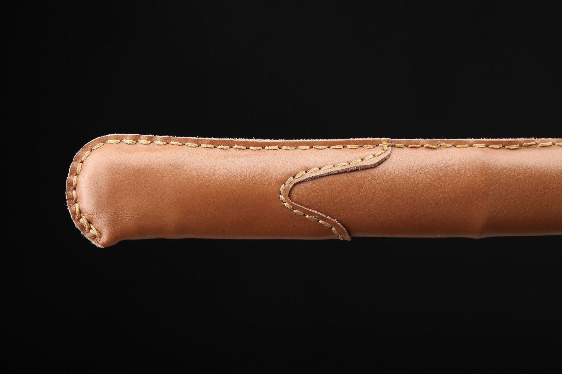 Close-up of the leather scabbard tip on S426 katana.