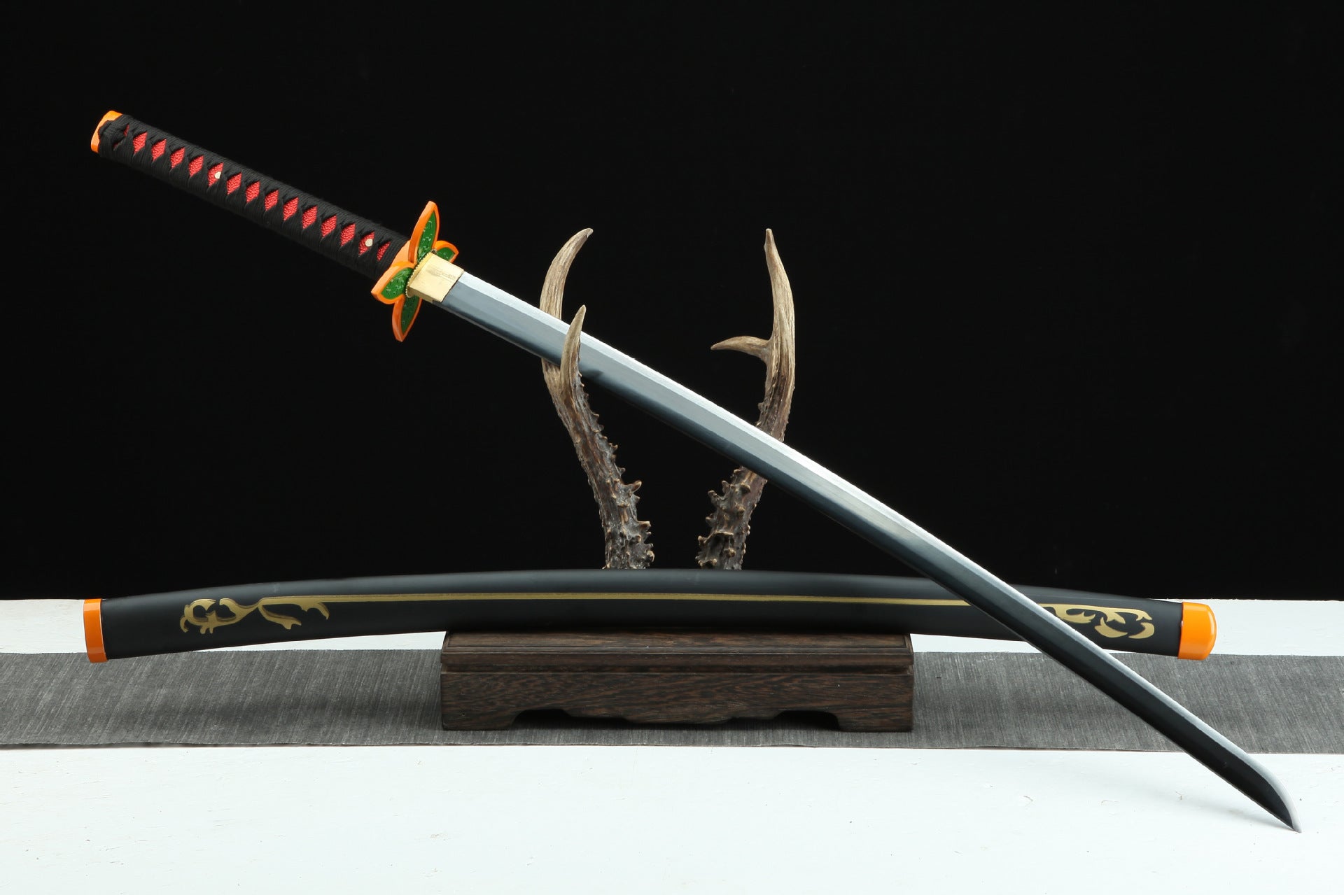 Shinobu’s Nichirin sword from Demon Slayer with its butterfly-shaped guard and slender design.
