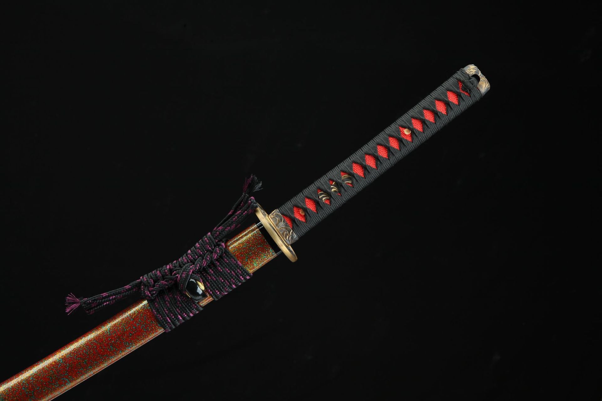Partial view of Shinrin Samurai Sword showcasing the handle and tsuka-ito (cord wrapping), with intricate fittings and decorative tsuba.