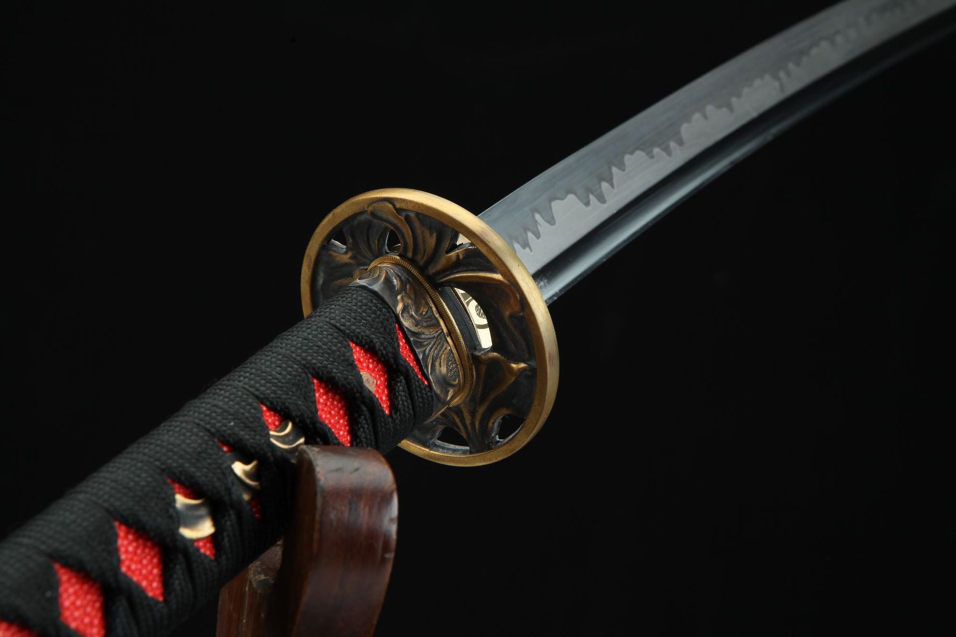 Close-up of Shinrin Samurai Sword tsuba (guard) with detailed design and intricate craftsmanship.