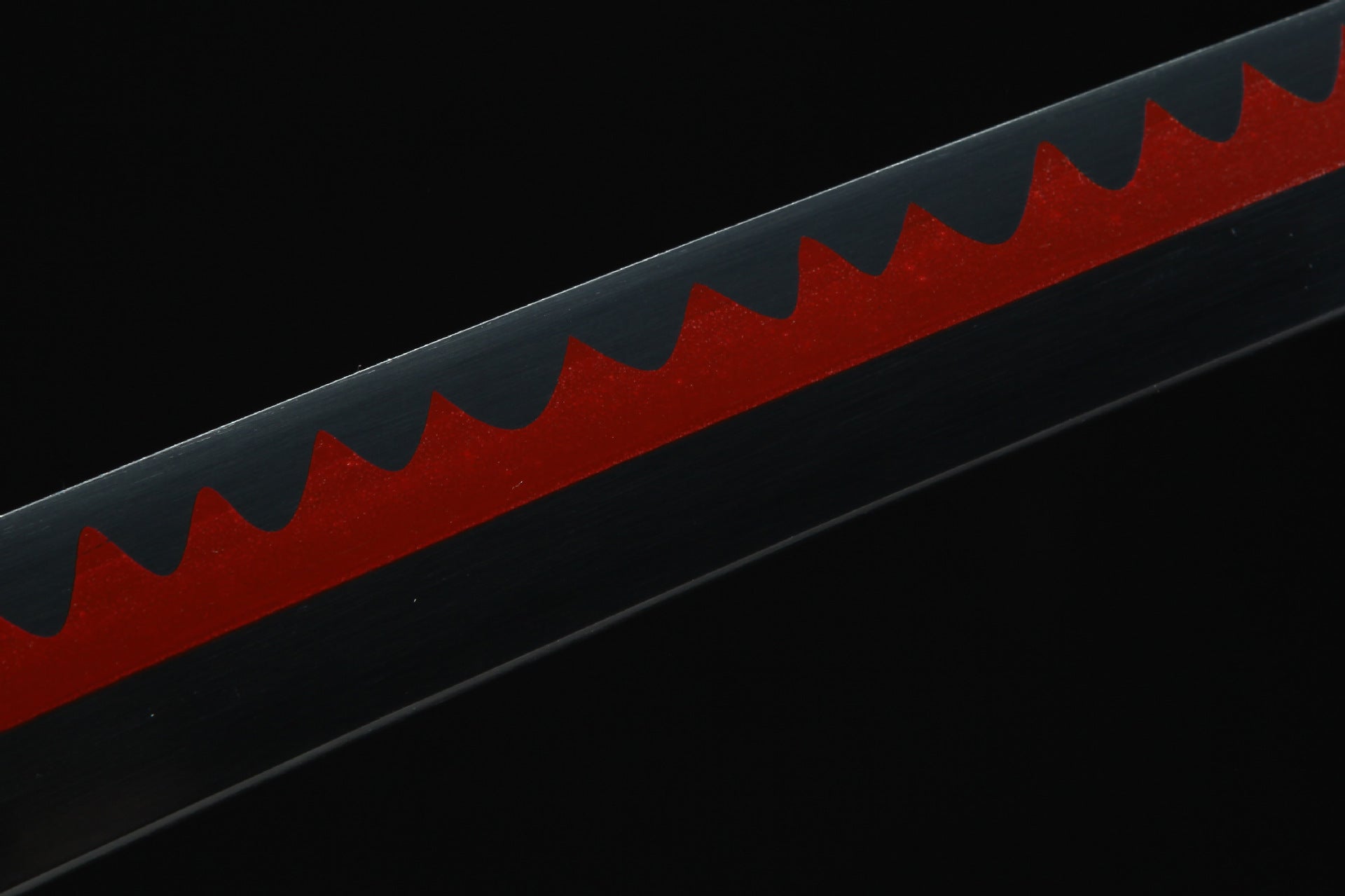 Blade of Shusui sword from One Piece, showcasing a black body with detailed red hamon pattern.