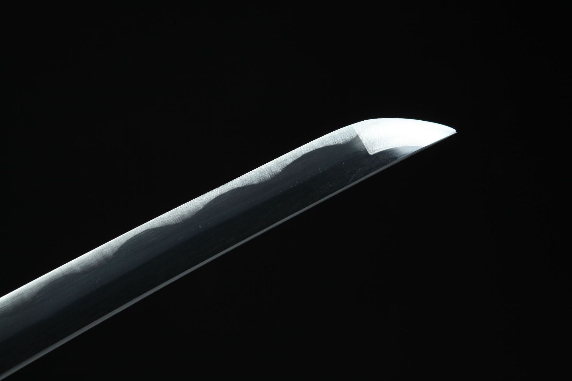 The tip of the Yubashiri sword, showcasing its exquisite craftsmanship.