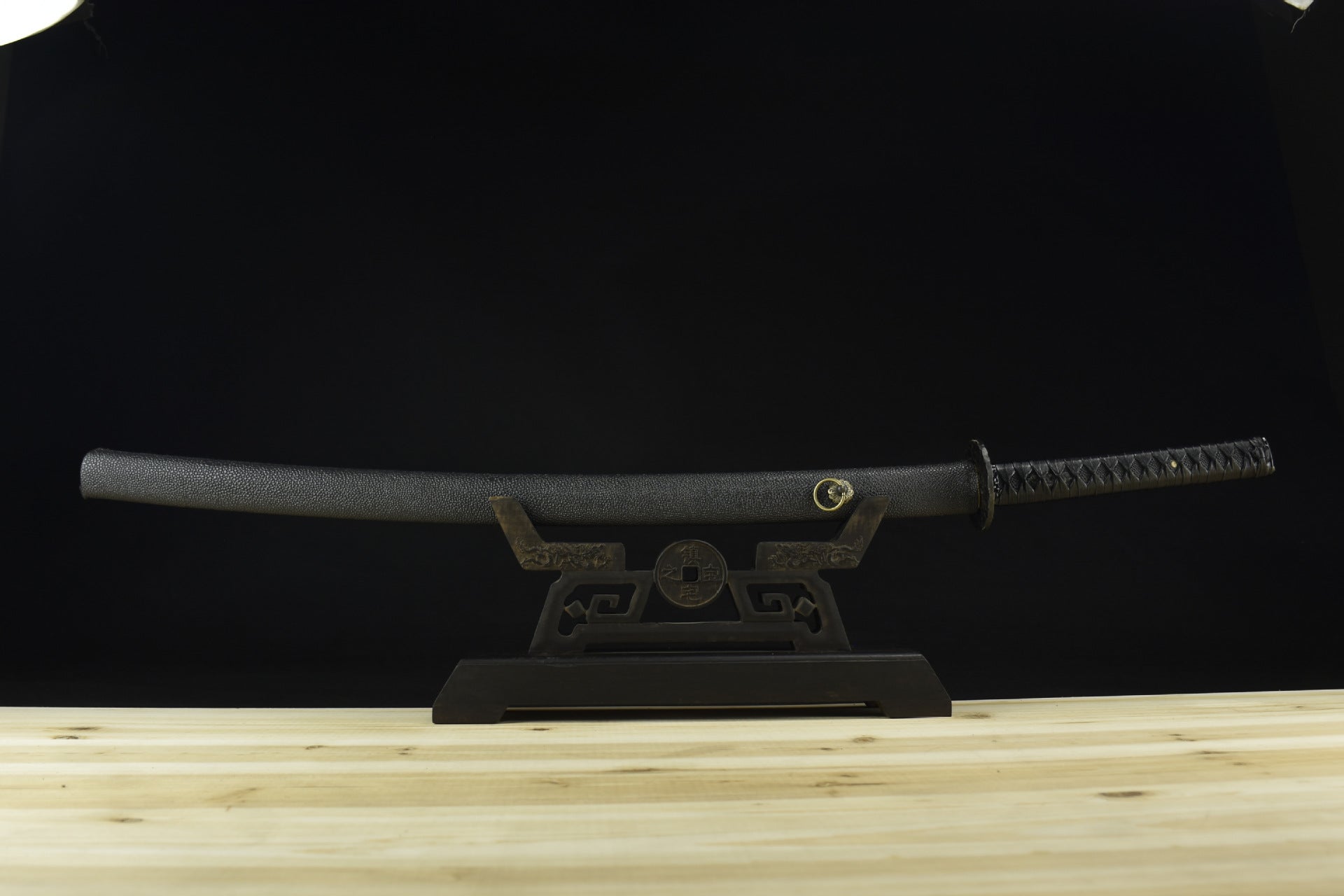 all-black katana sword elegantly sheathed