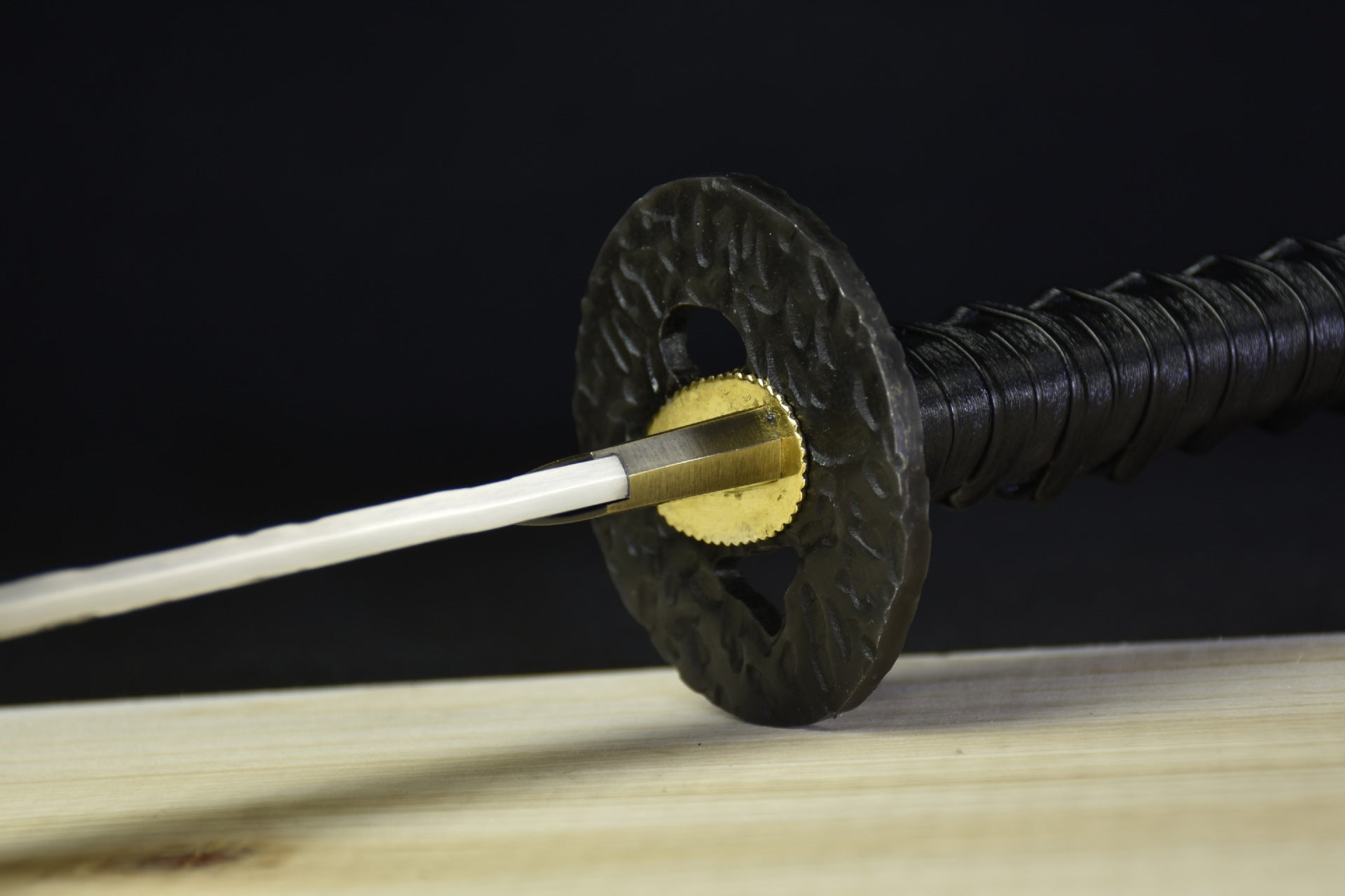 black tsuba for sale, a classic accessory for any Japanese sword collection.