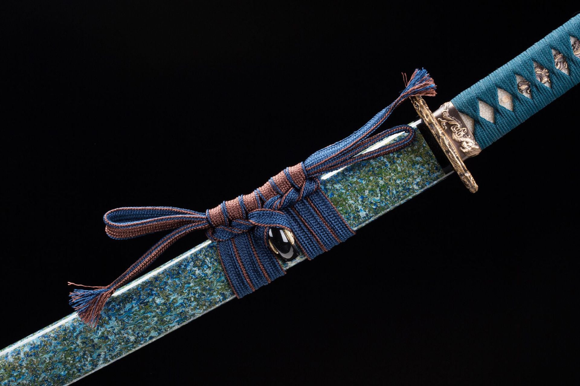 A luxurious blue-green lacquered katana scabbard featuring a horn kurigata.