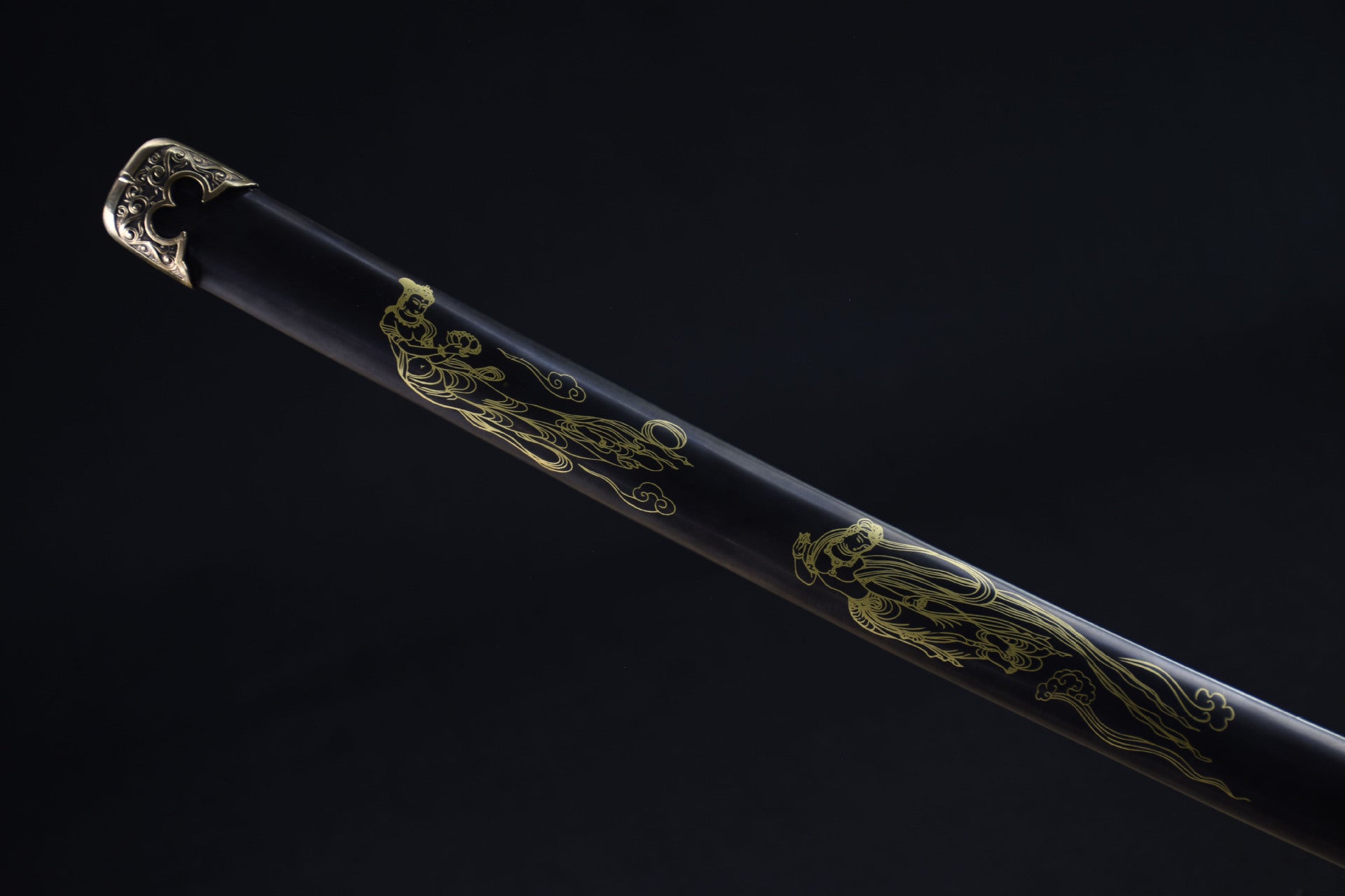 Close up of the Celestial samurai sword scabbard featuring ornate gold goddess engravings