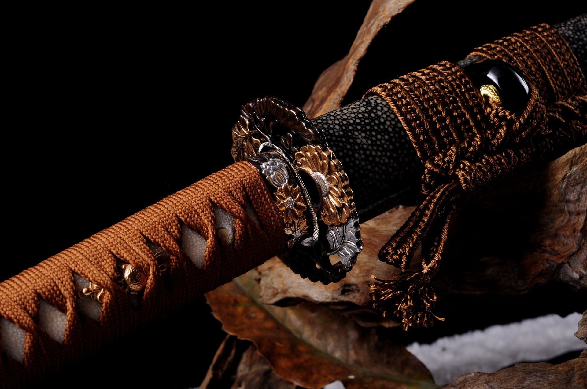 Gilded and silvered openwork tsuba on Daisy katana.