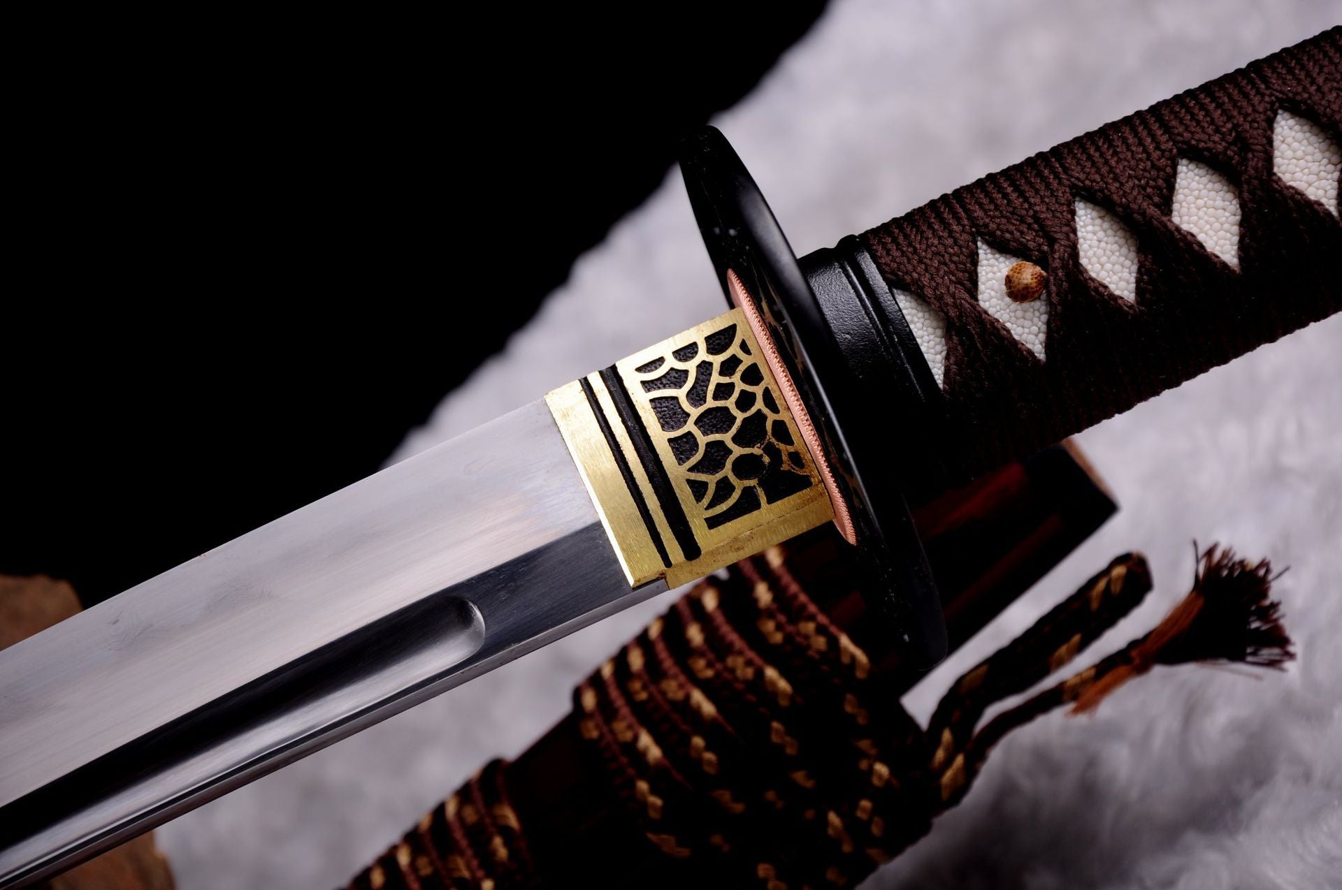 Detailed fuchi on a Kashin katana ensures a tight fit into the scabbard.