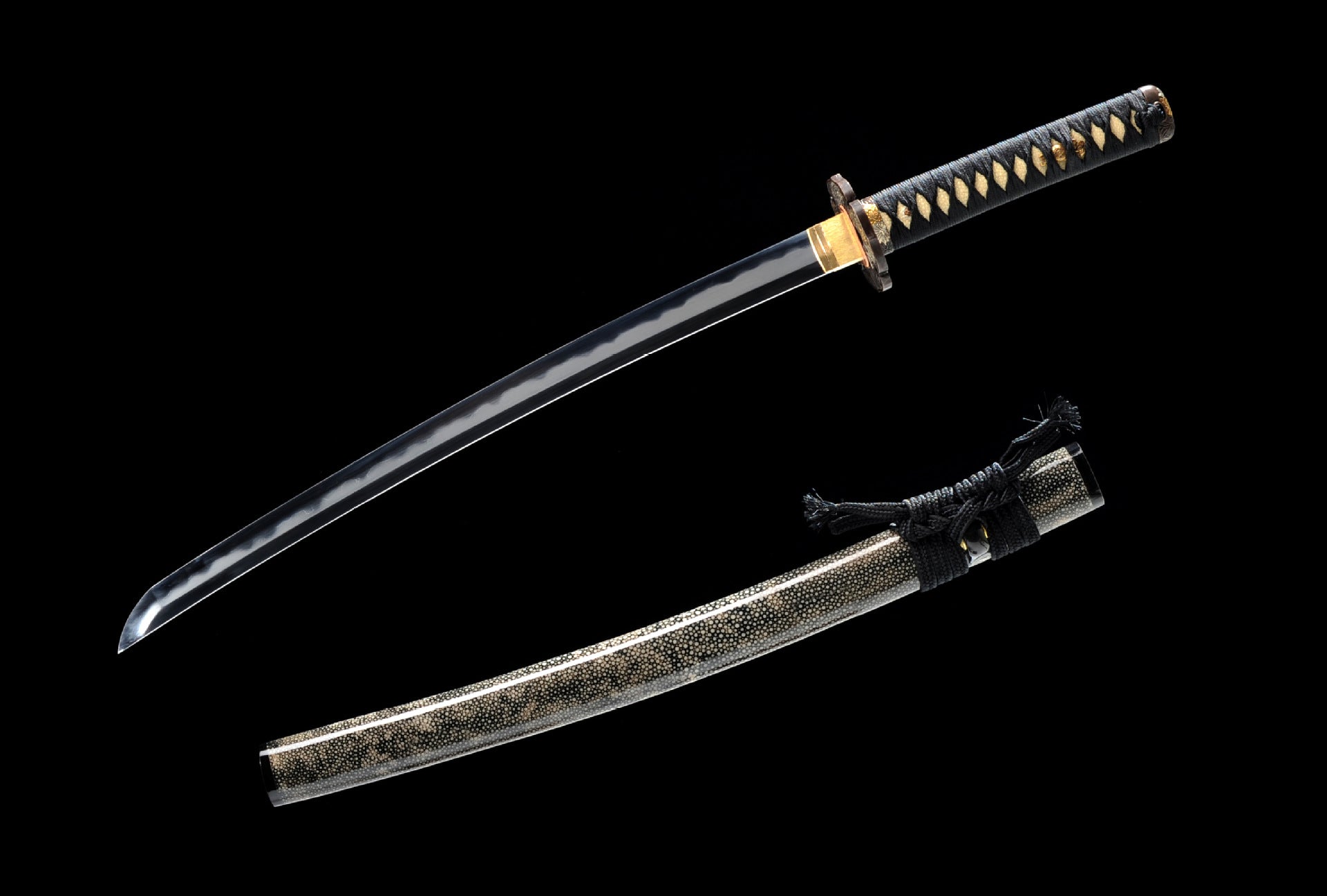 Kobuse-forged katana with ray skin saya.