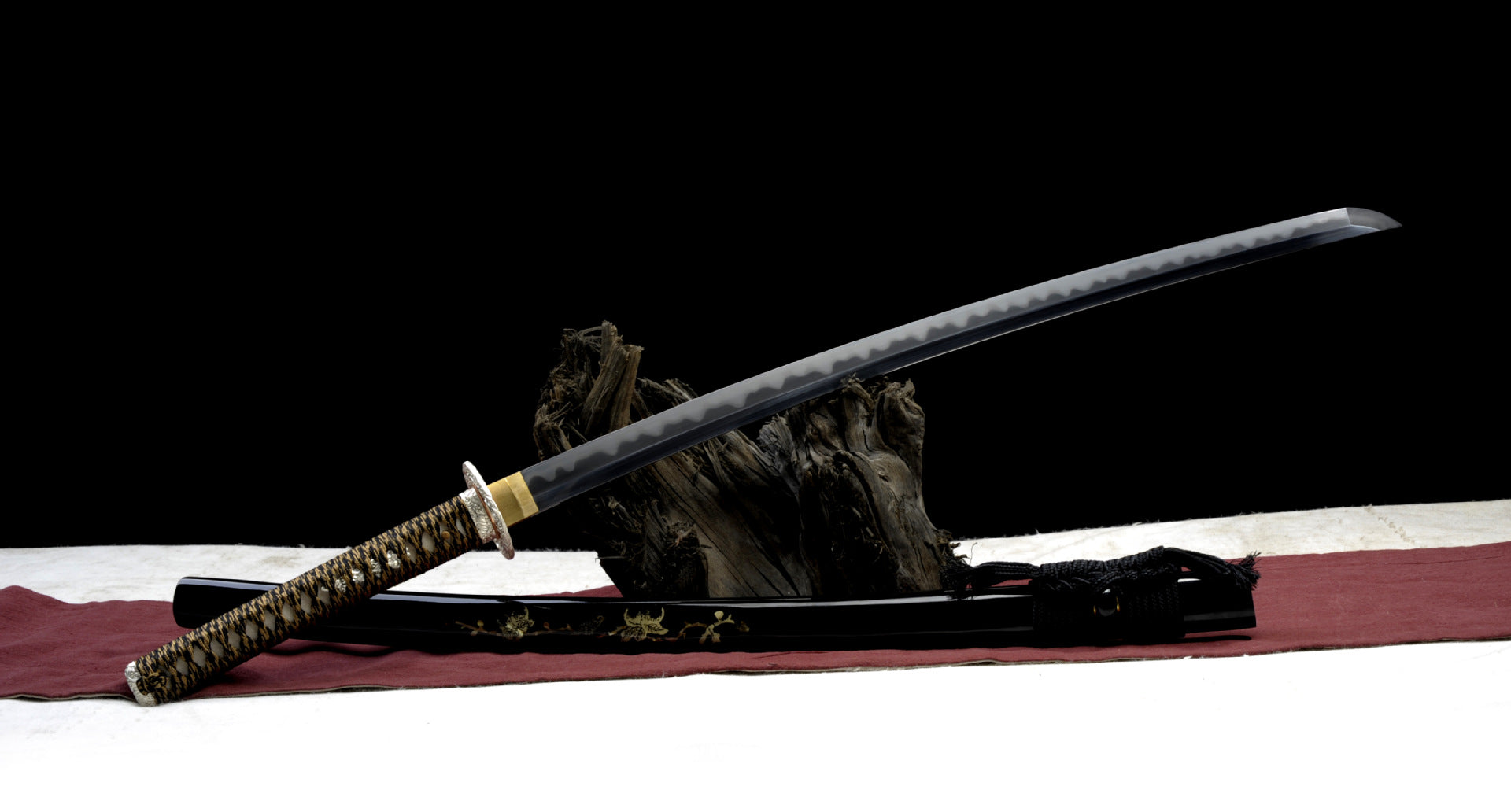 Kobuse-forged katana with gunome hamon.