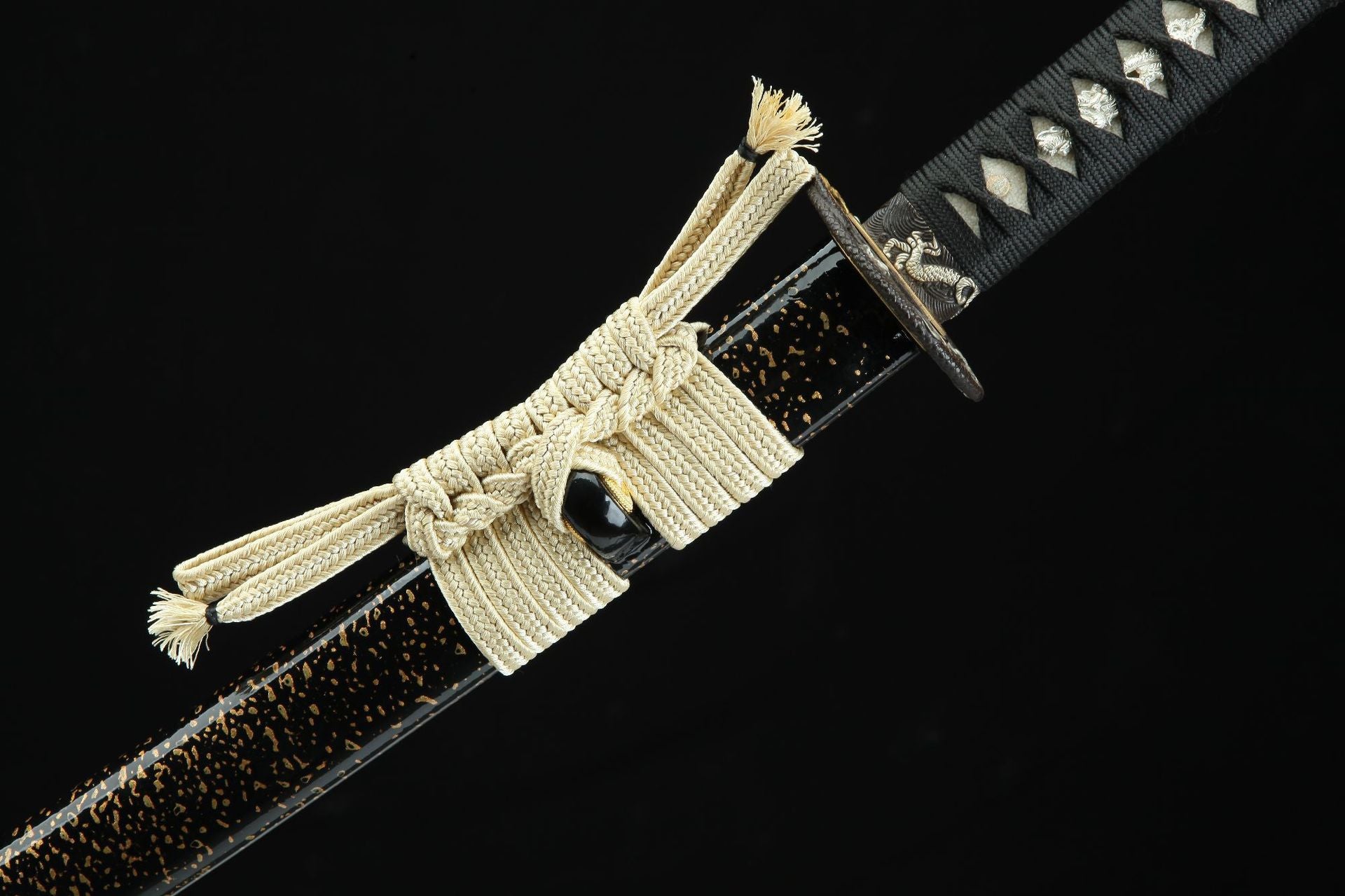 Close-up view of the Loong Clow katana's white sageo, showcasing the intricate traditional weaving used to secure the sword's scabbard to the belt.