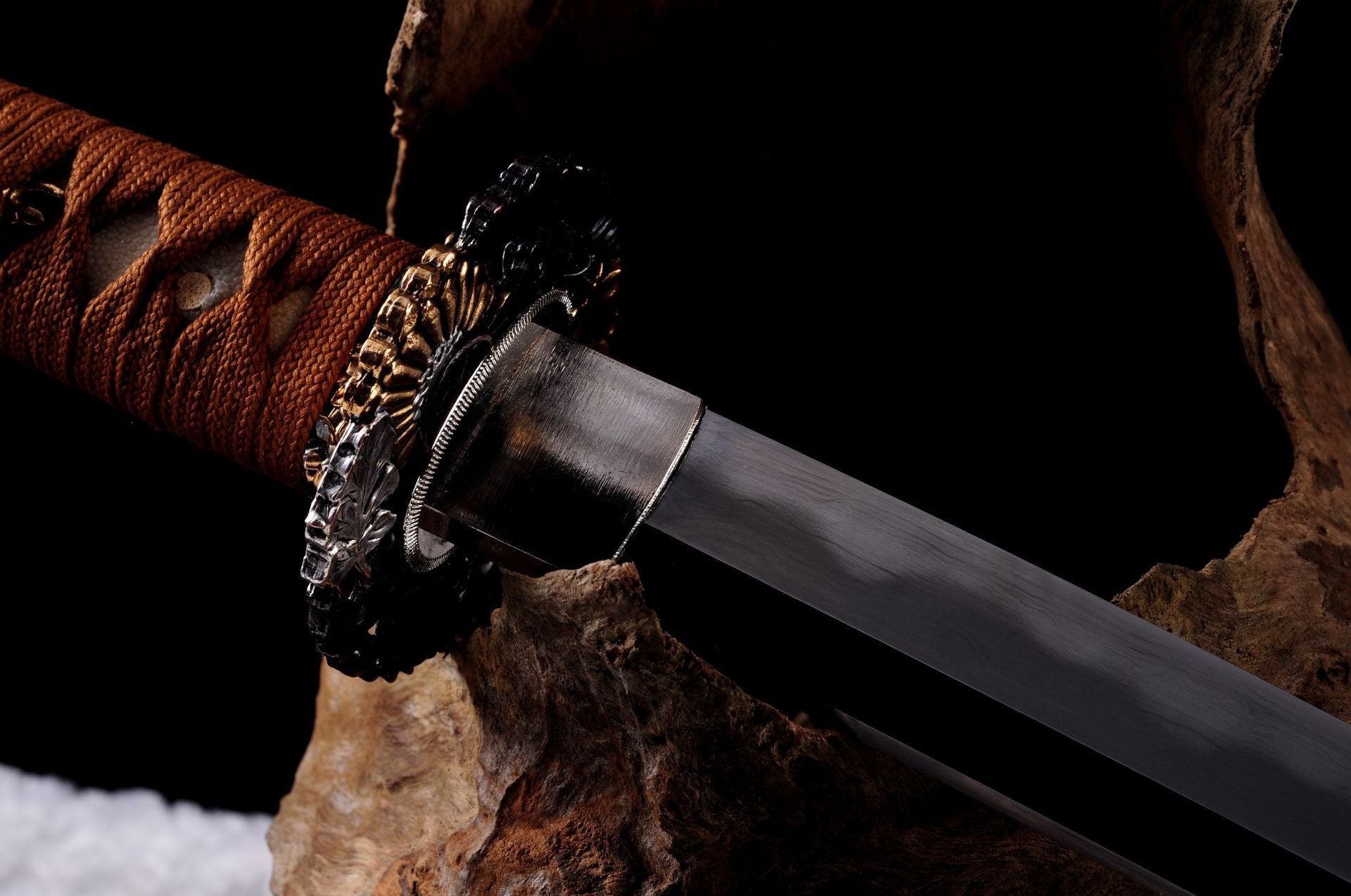 Metal habaki on Daisy katana, crucial for securing the blade.