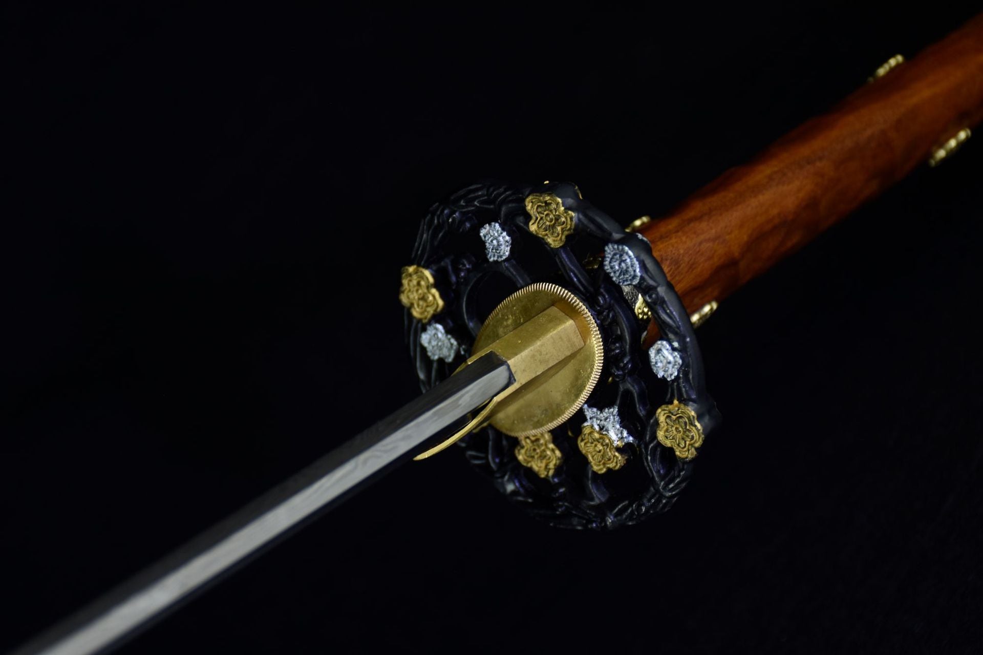 Moonlit Sakura samurai sword tsuba with sakural design and gold and silver embellishments.