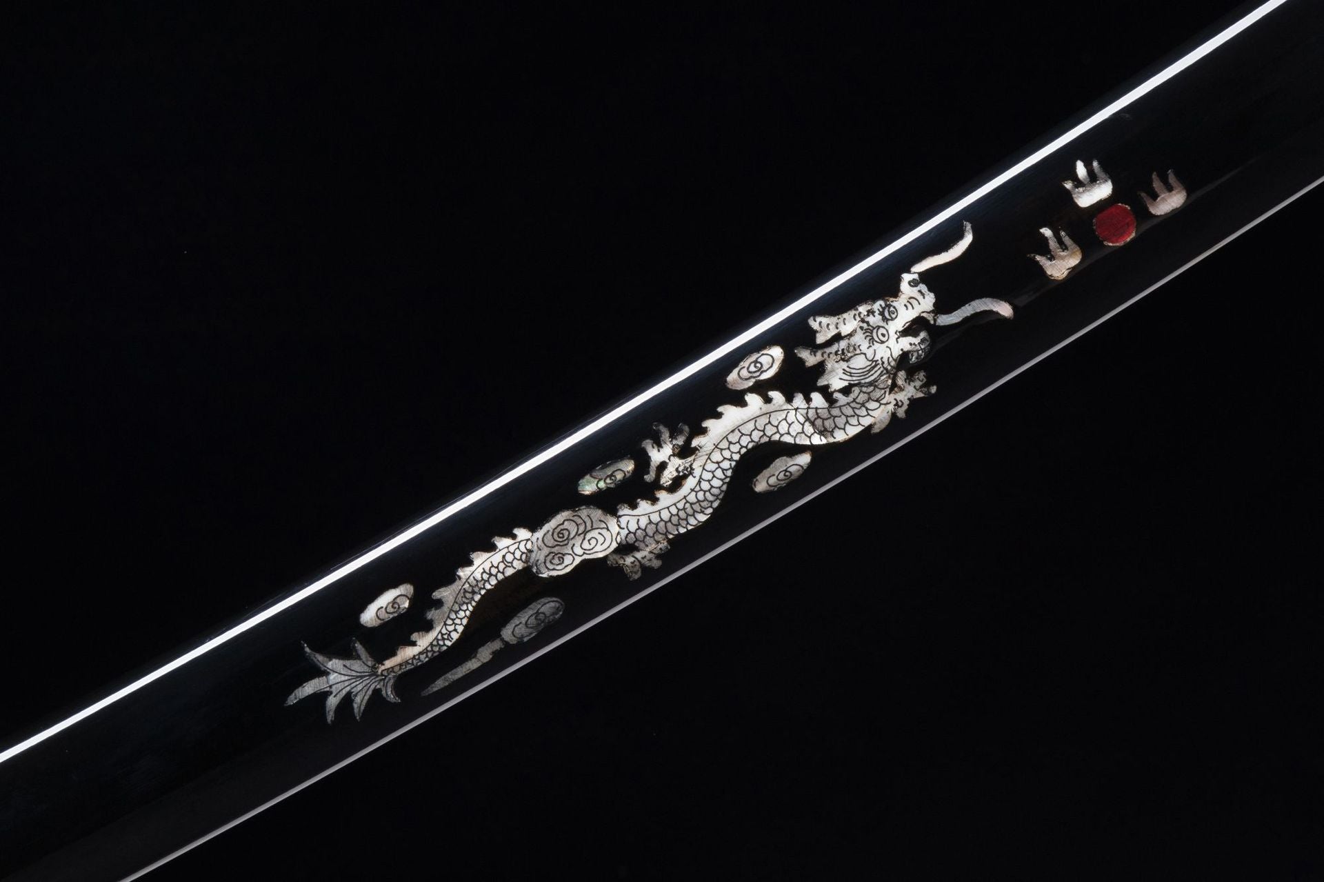 Exquisite loong raden on the Orochi katana's scabbard, highlighting traditional Japanese decorative art.