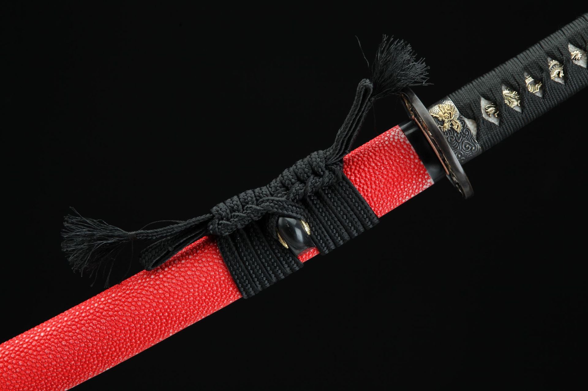 Close-up of sakura ryu katana's sageo, the traditional cord used to tie the scabbard to the belt.
