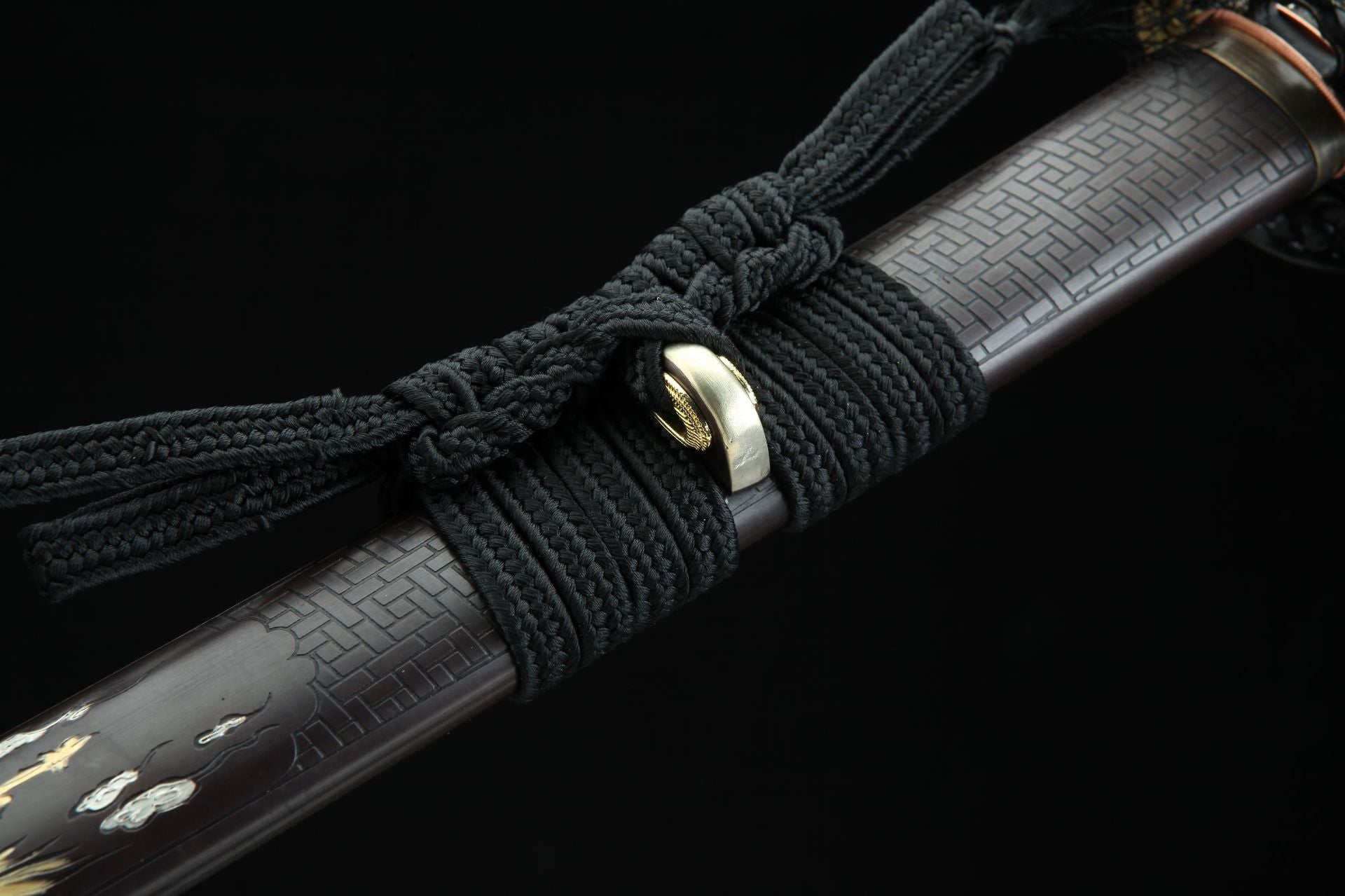 Detailed view of the sageo and textured saya of the Ssangyong katana.
