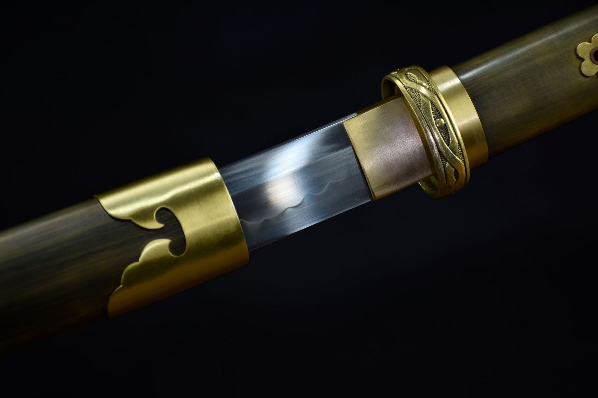 A T10 steel katana blade with a copper koiguchi, emphasizing clean lines, durable materials, and a modern minimalist aesthetic.