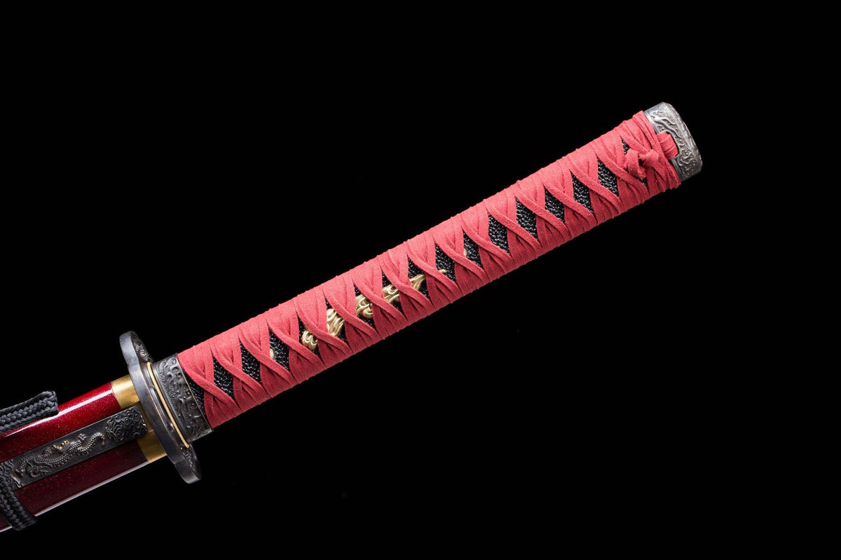 Red tsuka wrap and dark fittings on the Cinnabar Katana