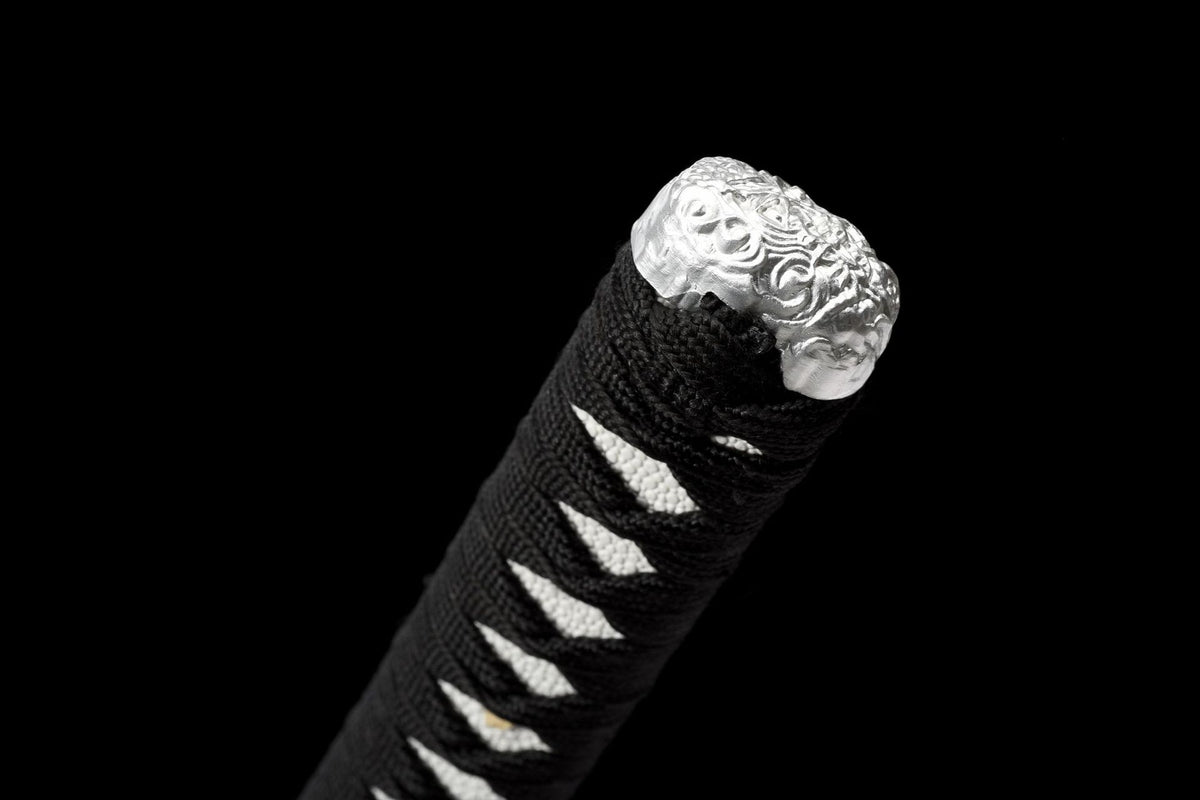 Blade tip with decorative wave line
