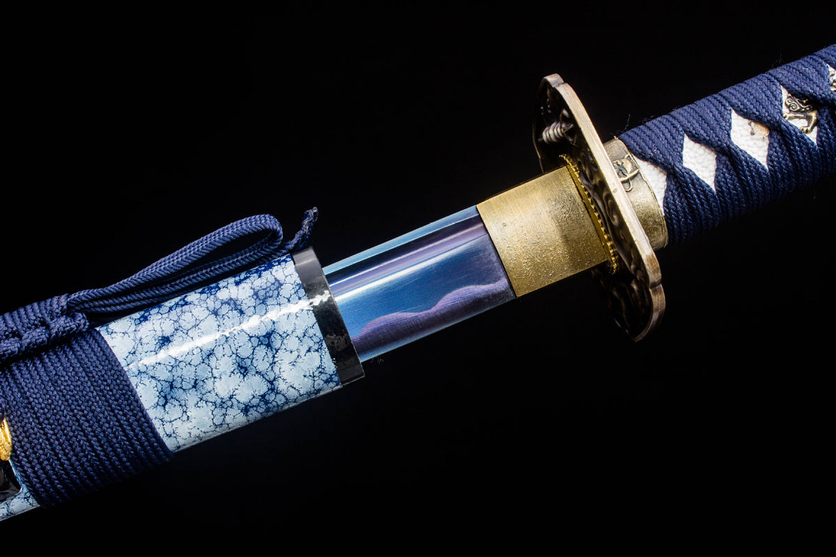 Close-up of the Indigo Frost Katana’s blue blade, gold collar, and navy handle wrap