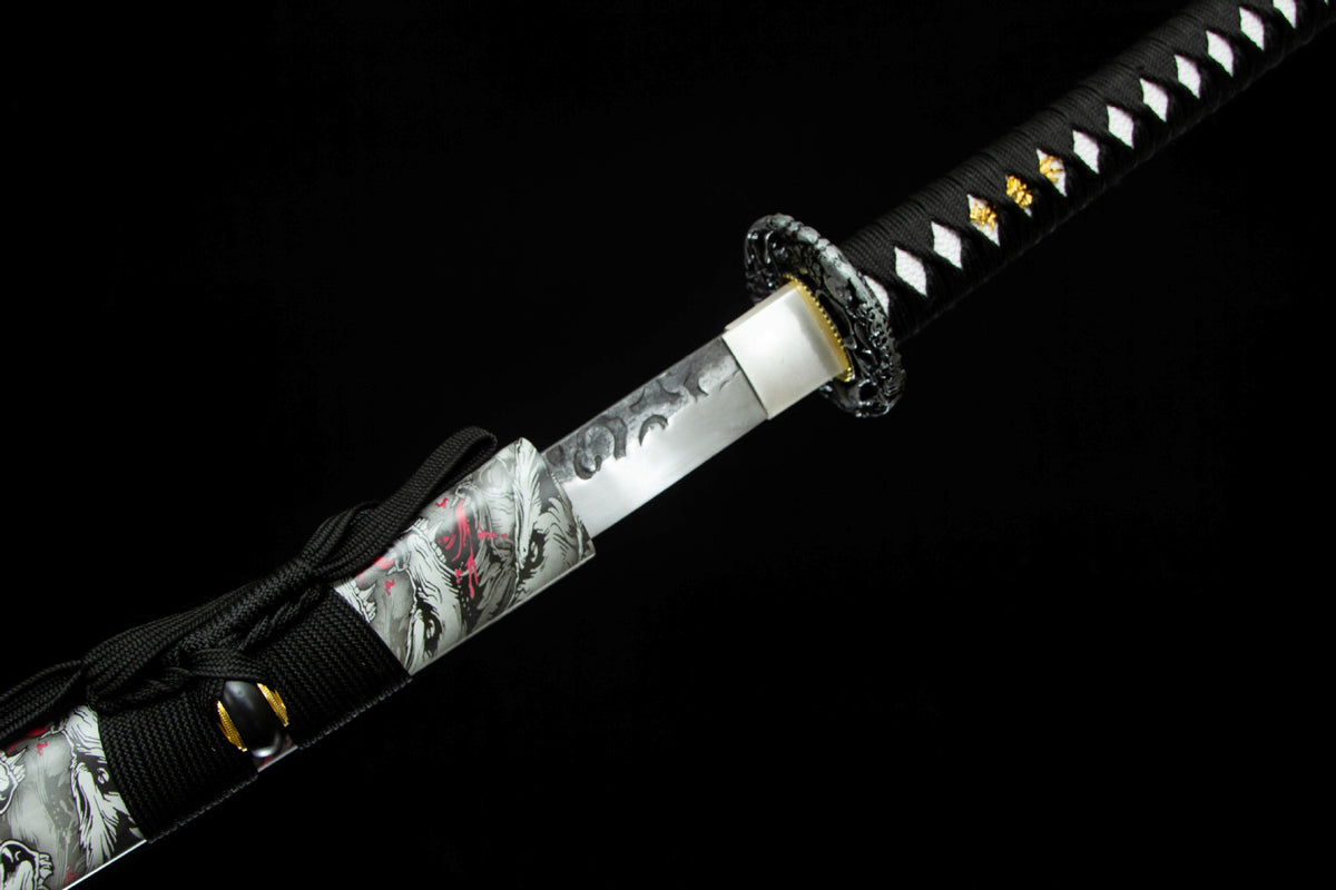 Close-up of the Autumn Mist Katana’s black handle wrap, ornate guard, and patterned saya