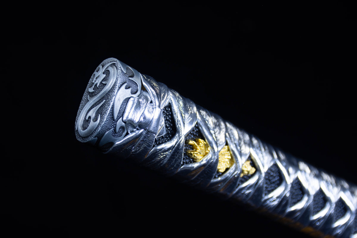 Silver Cloud Katana showing its patterned handle and engraved blade