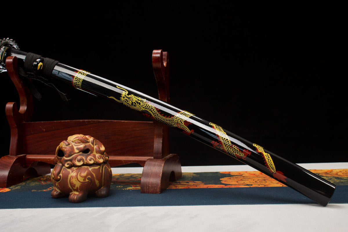 Detail view of the Night Coil Katana, showing the silver blade and black saya