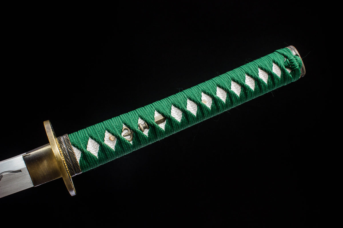 Close-up of the Jade Striation Katana’s green handle wrap, white grip panels, and fittings
