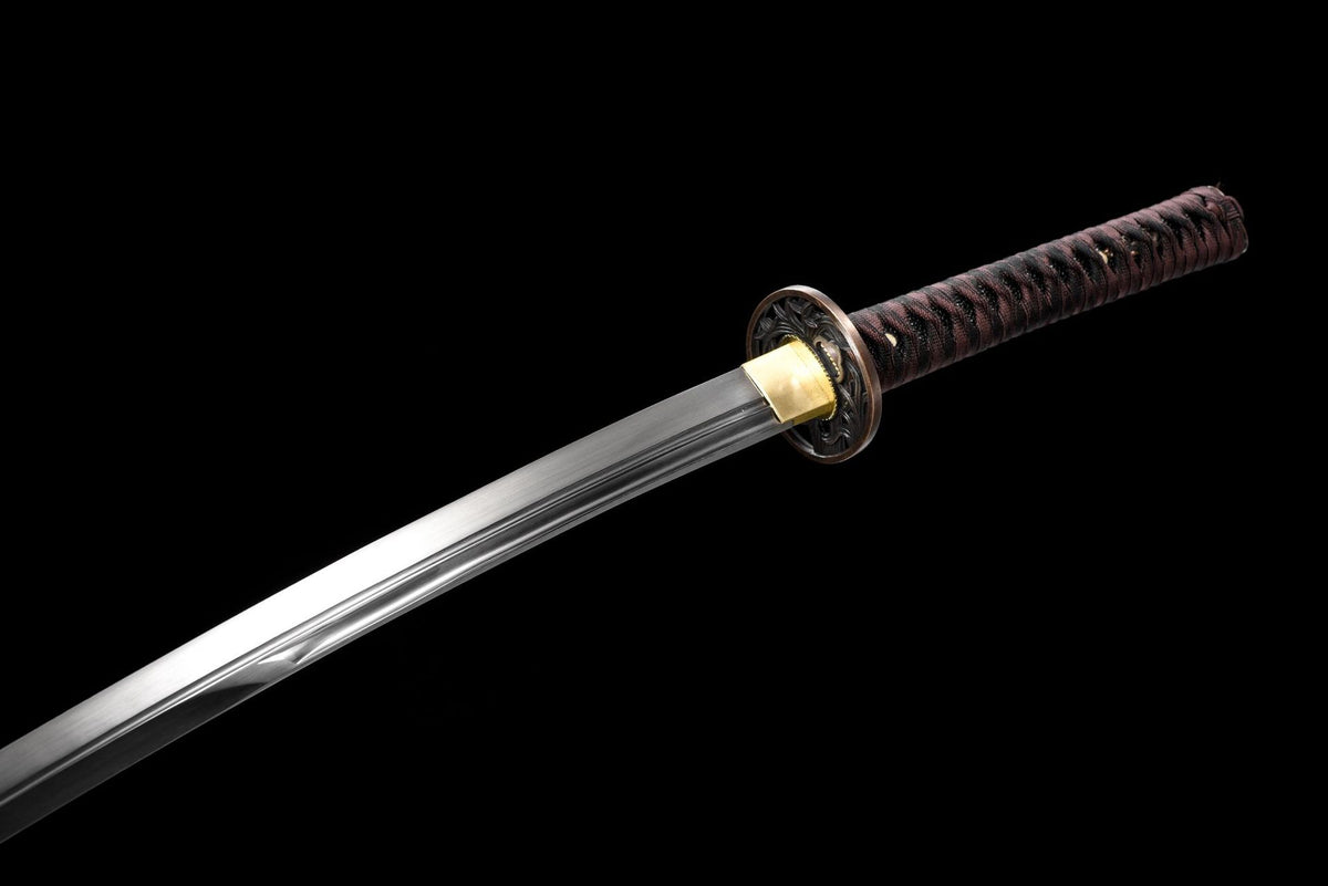 Night Current Katana showing the dark handle wrap and reddish-brown saya