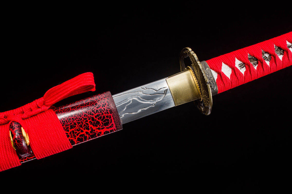 The Crimson Crackle Katana with the dark mounting against the red lacquer