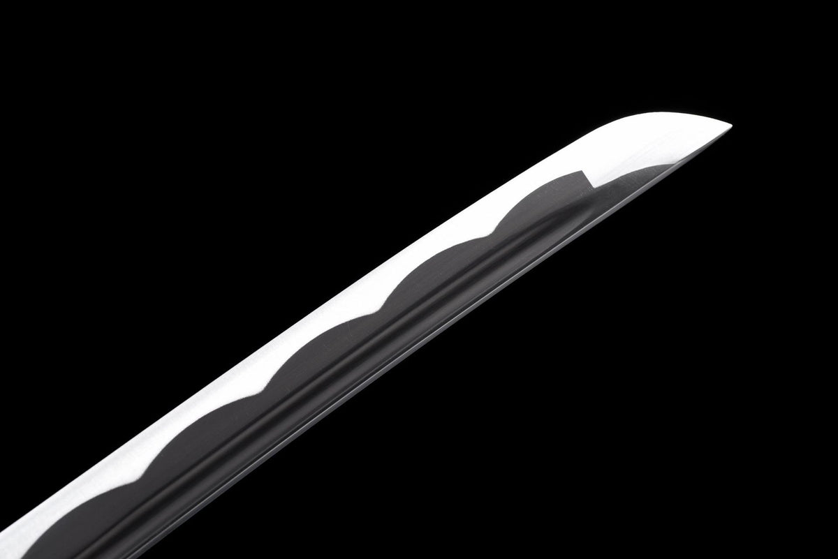 Close view of blade tip and dark patterned surface