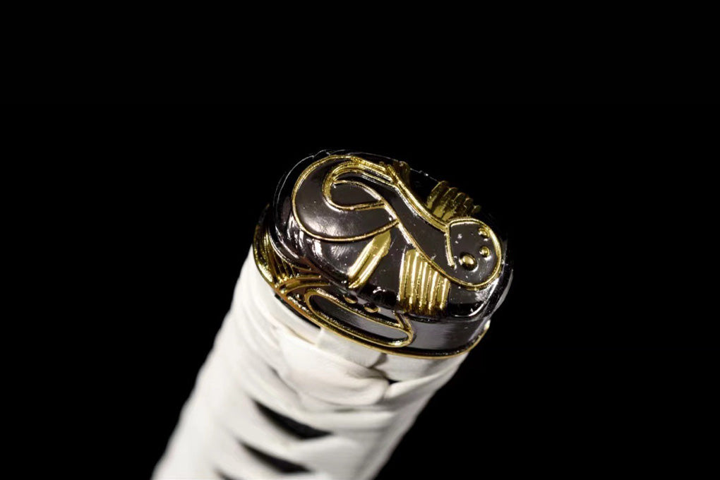 Close-up of the Yamato Katana’s white handle wrap and ornate gold-and-black end fitting