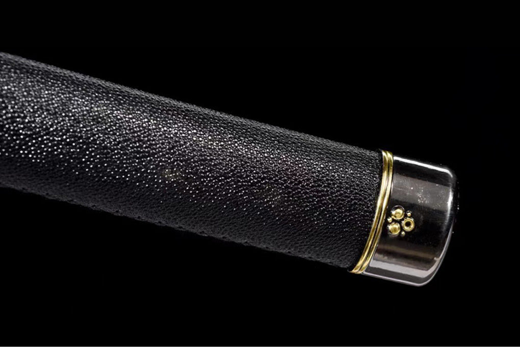 Detail view of the Devil May Cry Yamato Katana, showing the silver blade and white double-line finish