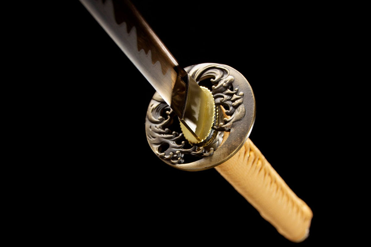 Close-up detail of the Golden Pearl Katana, including the gold handle wrap and fittings