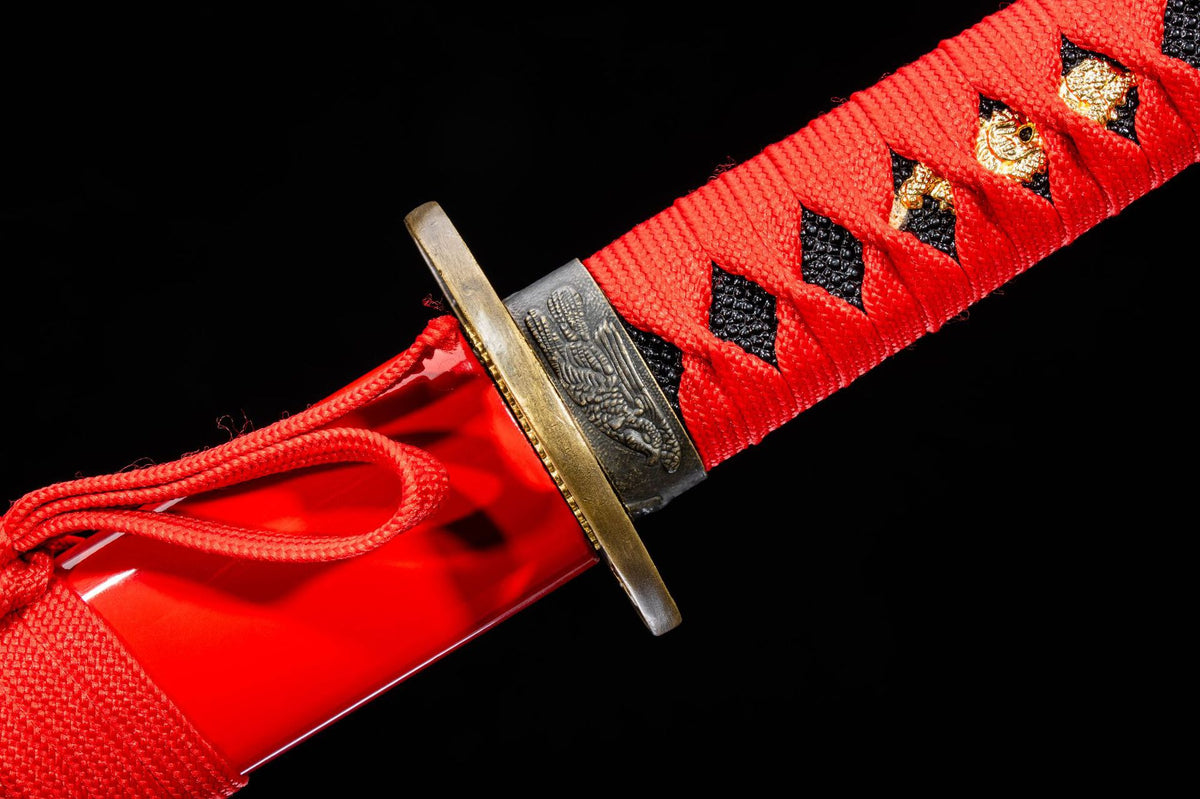 Detail view of the Crimson Blossom Katana, showing the blue-toned blade and dark handle