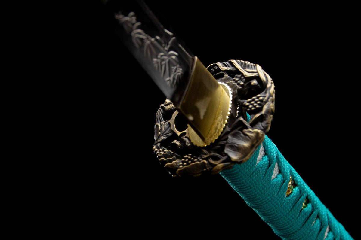 Close-up detail of the Turquoise Pearl Katana, including the sea-glass color palette and fittings