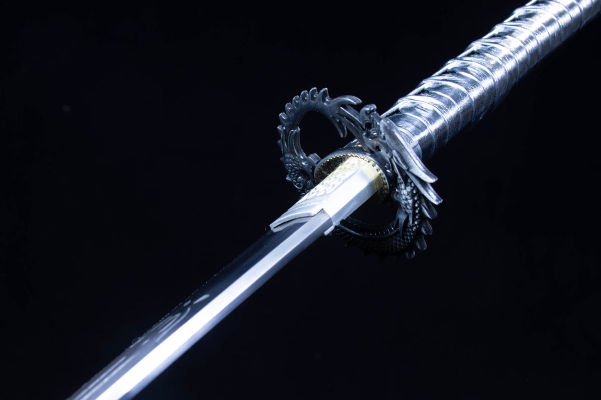 Silver Cloud Katana showing the engraved blade and dark patterned handle