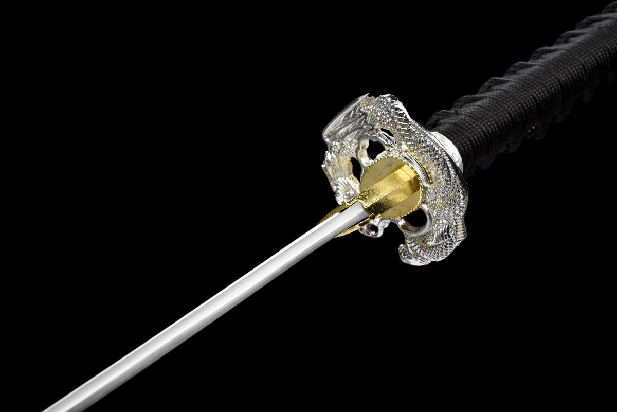 Close view of the double-dragon openwork guard