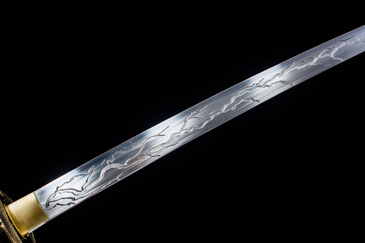 The Crimson Crackle Katana with the dark mounting against the red lacquer