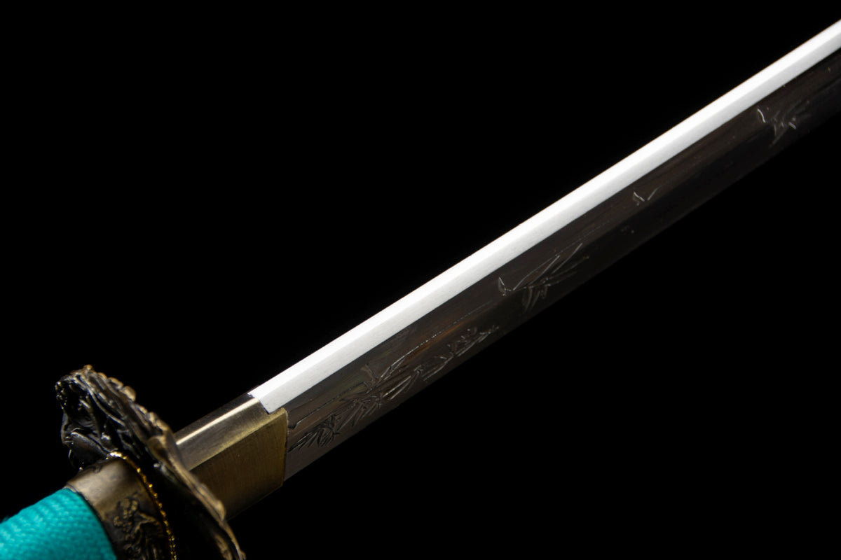 Detail view of the Turquoise Pearl Katana, showing the turquoise handle wrap and green marbled saya