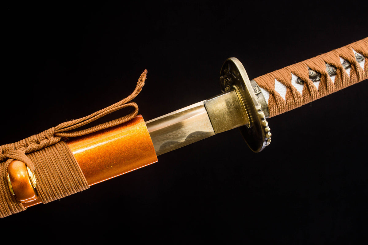 The Sakura in Gold Katana with the warm-toned fittings and blade collar