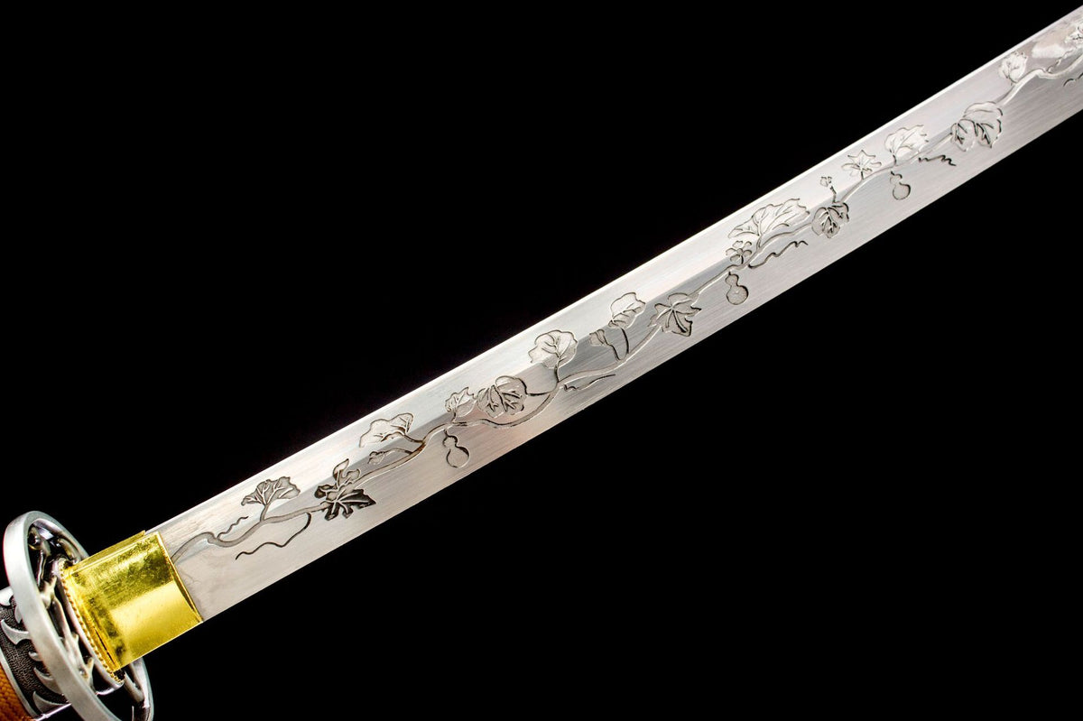Close-up of the Aureate Koi Katana’s decorated blade and fittings